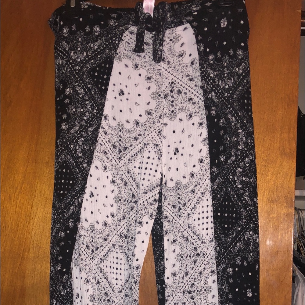 Loose wide leg black and white dress pants.